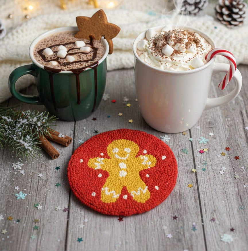 Gingerbread man punch needle coaster on wooden table