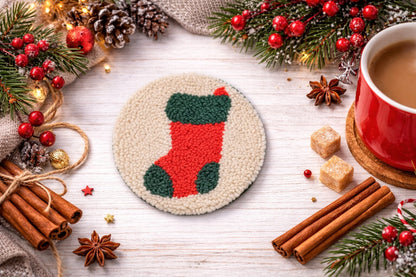 Christmas punch needle coasters in festive round designs on table - stocking