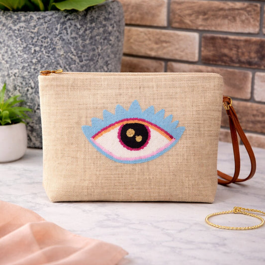Handmade evil eye punch needle jute clutch bag
