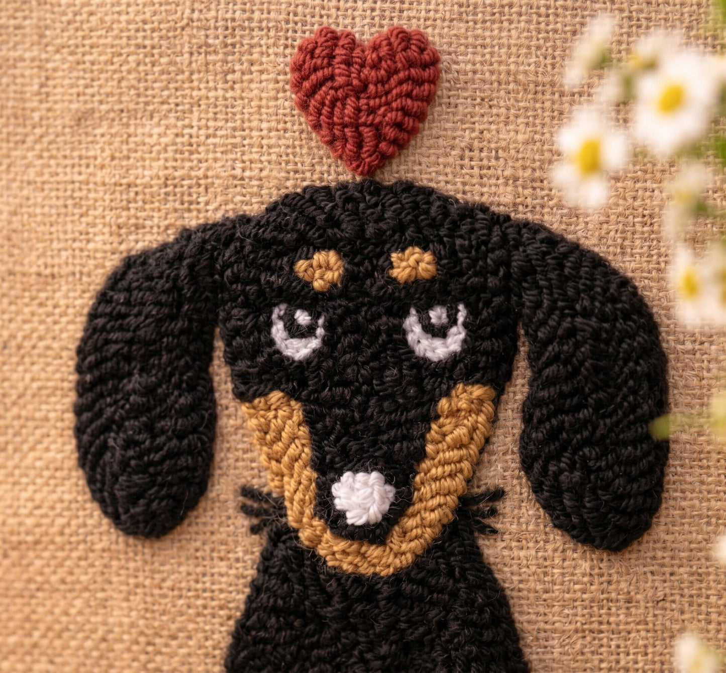 Punch needle dog face with red heart on burlap