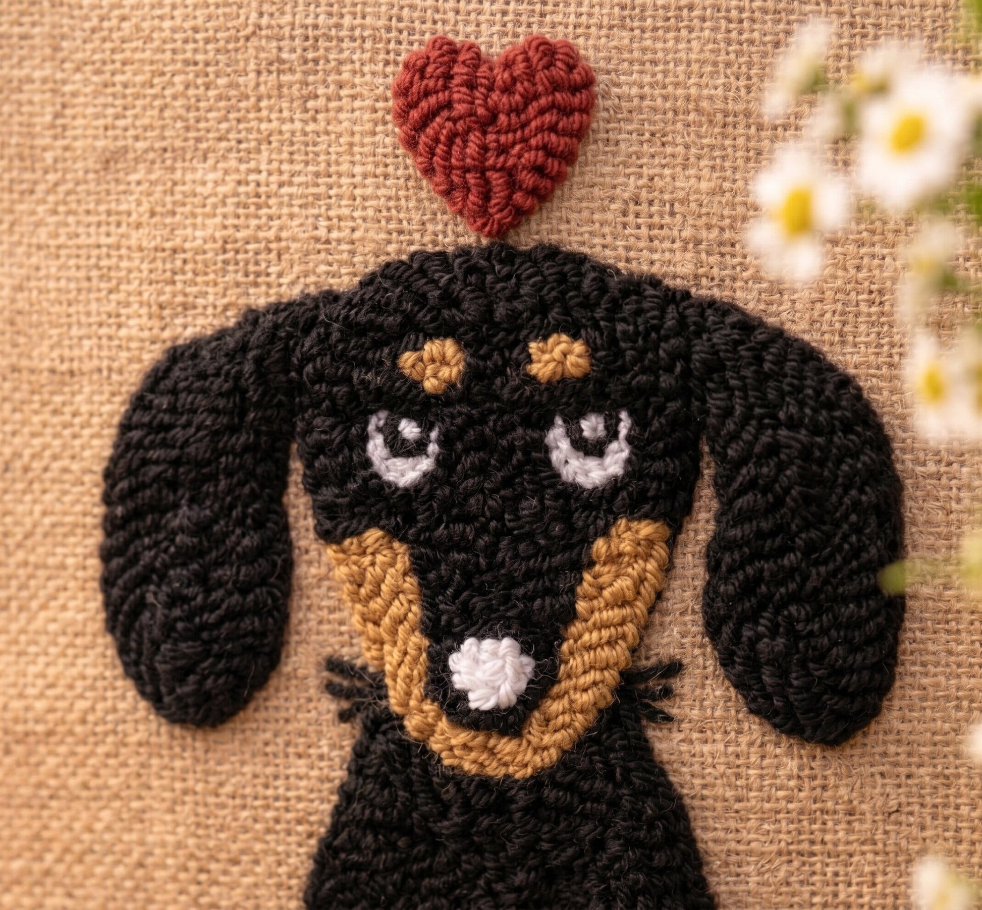Punch needle dog face with red heart on burlap