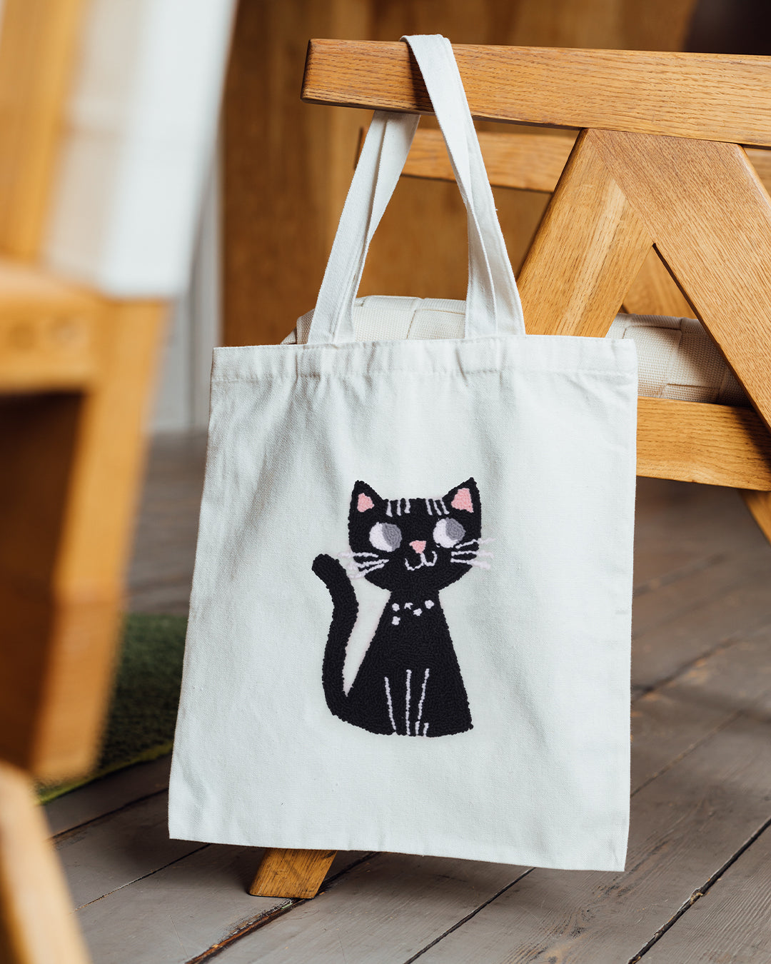 Black cat punch needle canvas tote bag on natural cotton