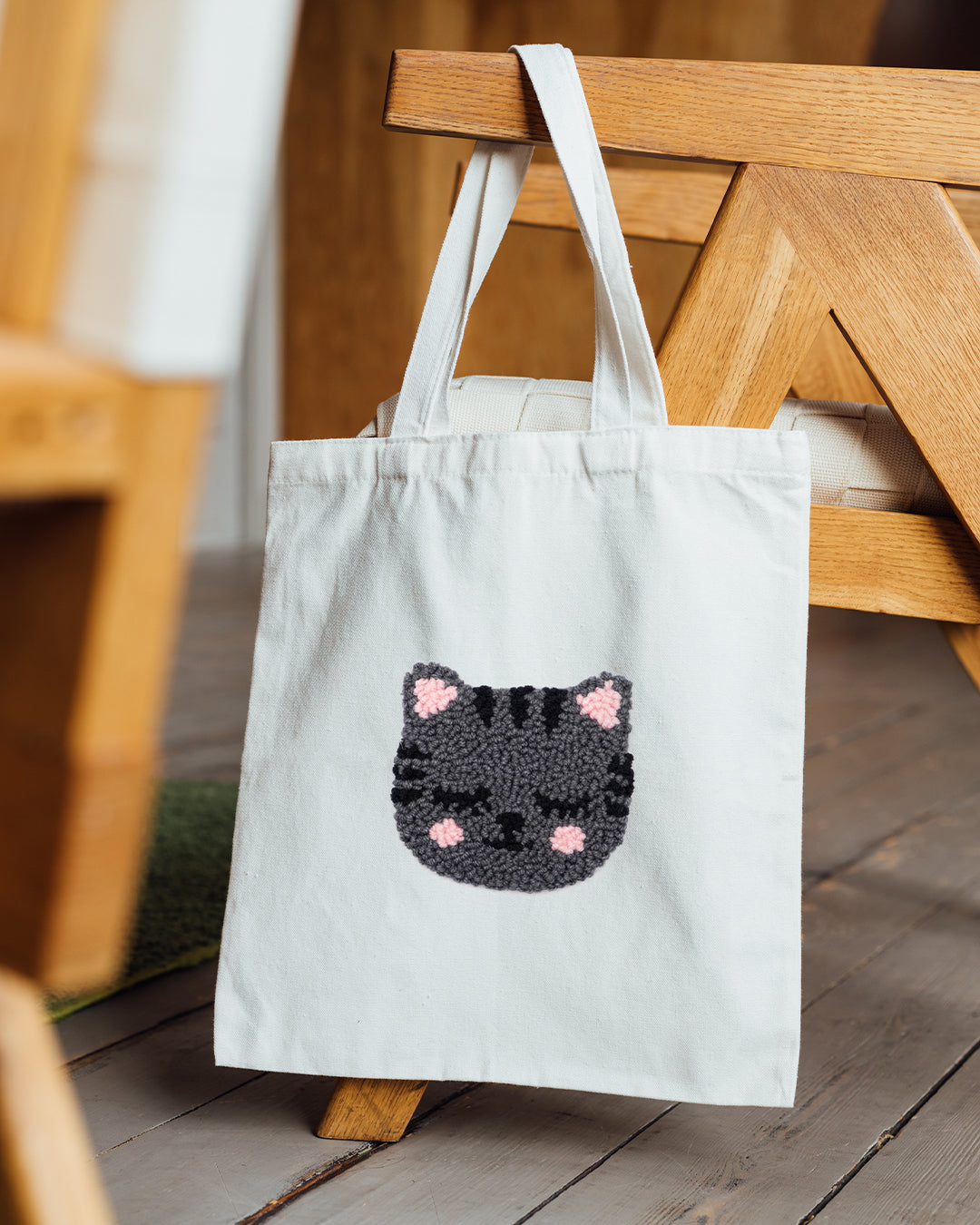 Pink cat face punch needle canvas tote bag on natural cotton